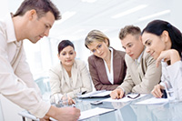 Team Discussing Employee Opinion Survey Results