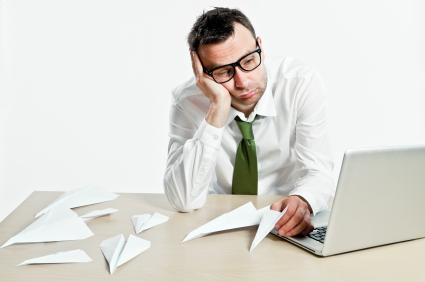 Unhappy employee taking an online survey - Peter Barron Stark Companies